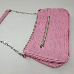 Pretty pink shoulder bag. Faux alligator look.
